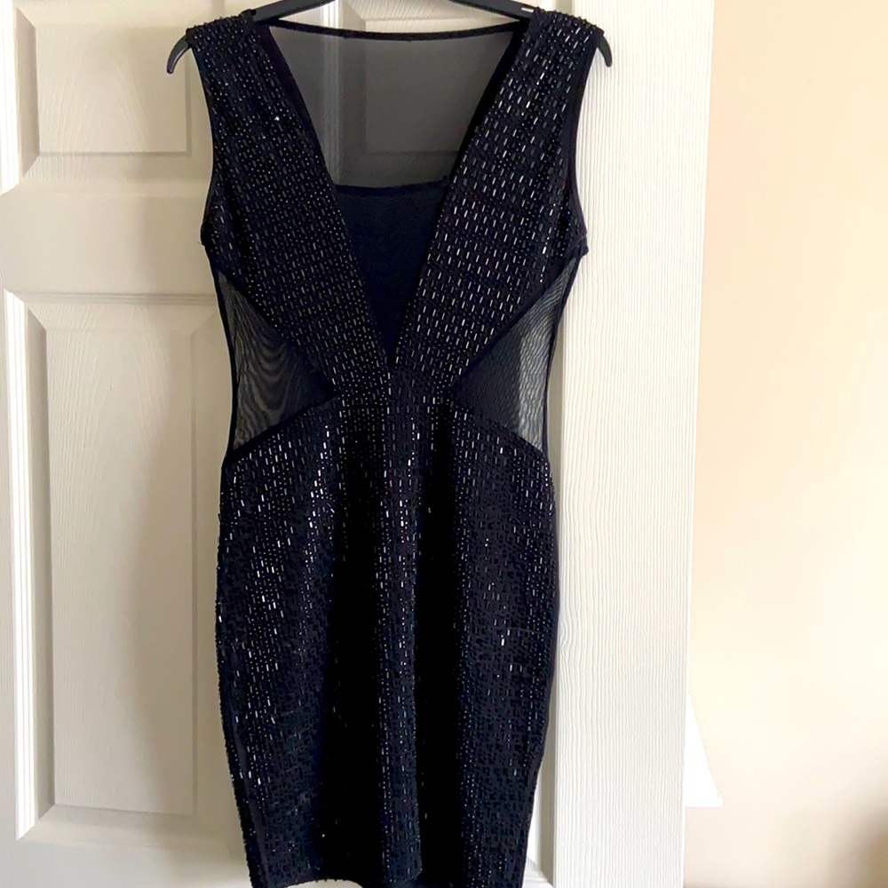 Black jeweled dress wore twice. Let’s feel amazing